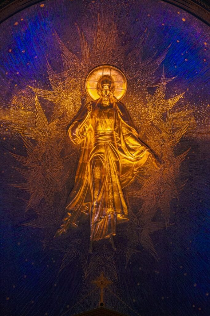 Home Illuminated icon of Jesus Christ in an ornate Orthodox church setting.